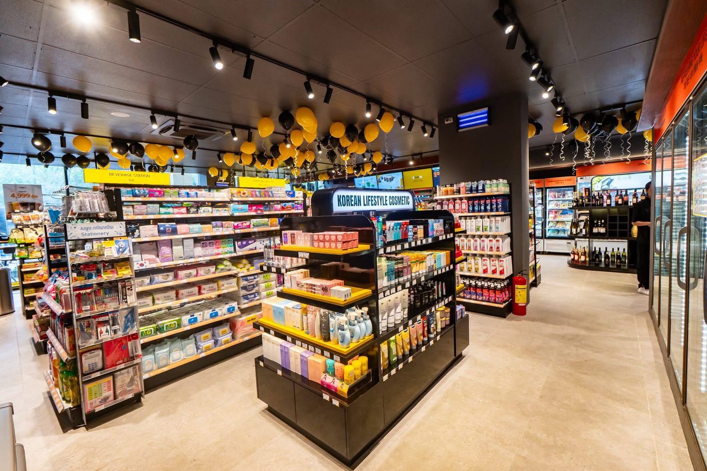 Bright store interior showing the Korean lifestyle cosmetic stand and stocked shelves